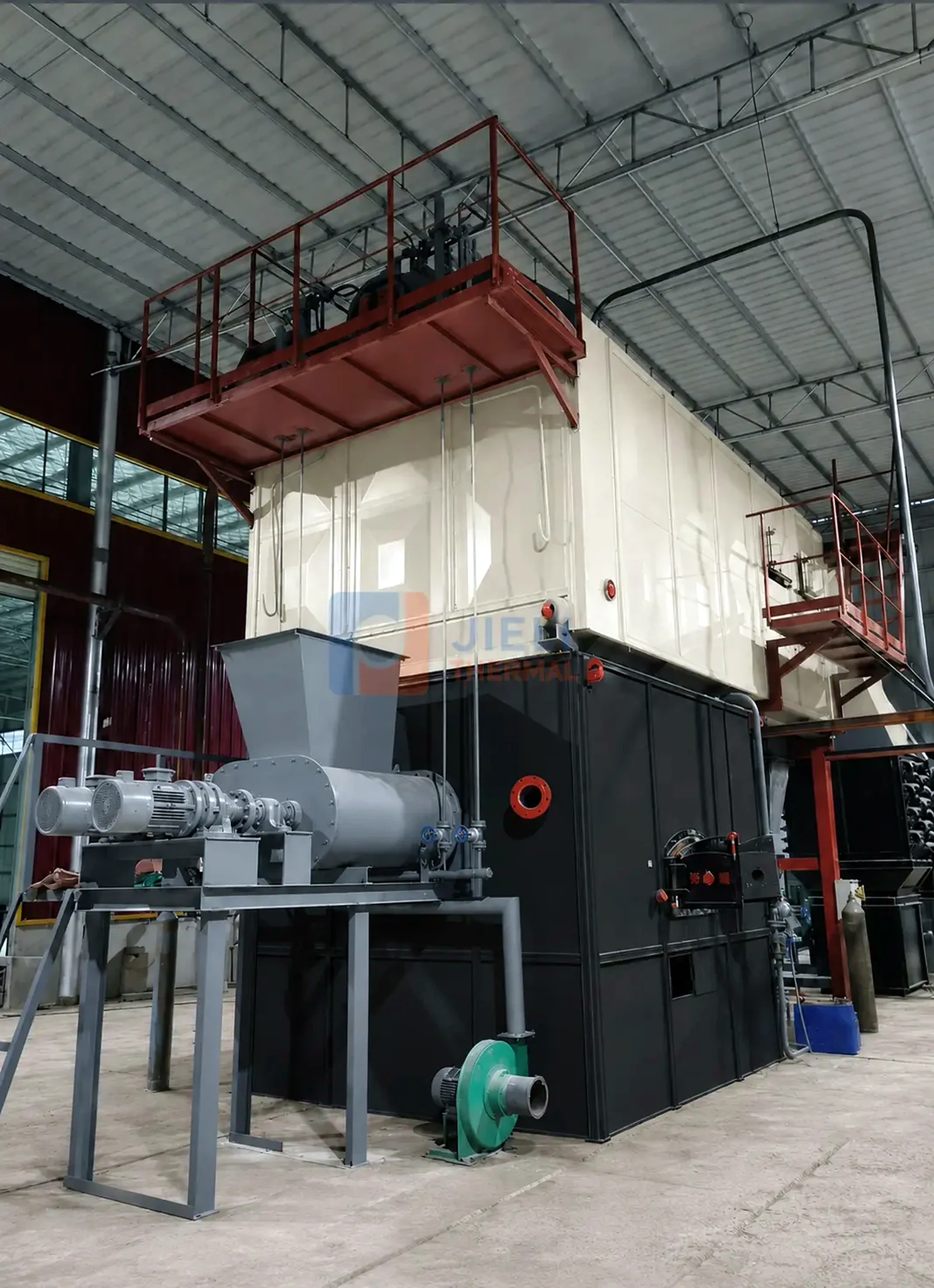 Biomass-fired steam boiler — side view in the production workshop