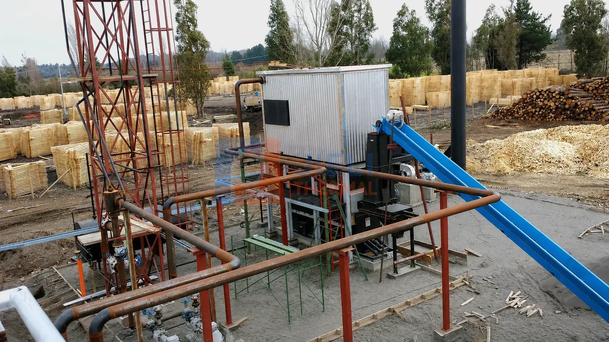 Biomass thermal oil heater project with conveyor and fuel-feeding equipment