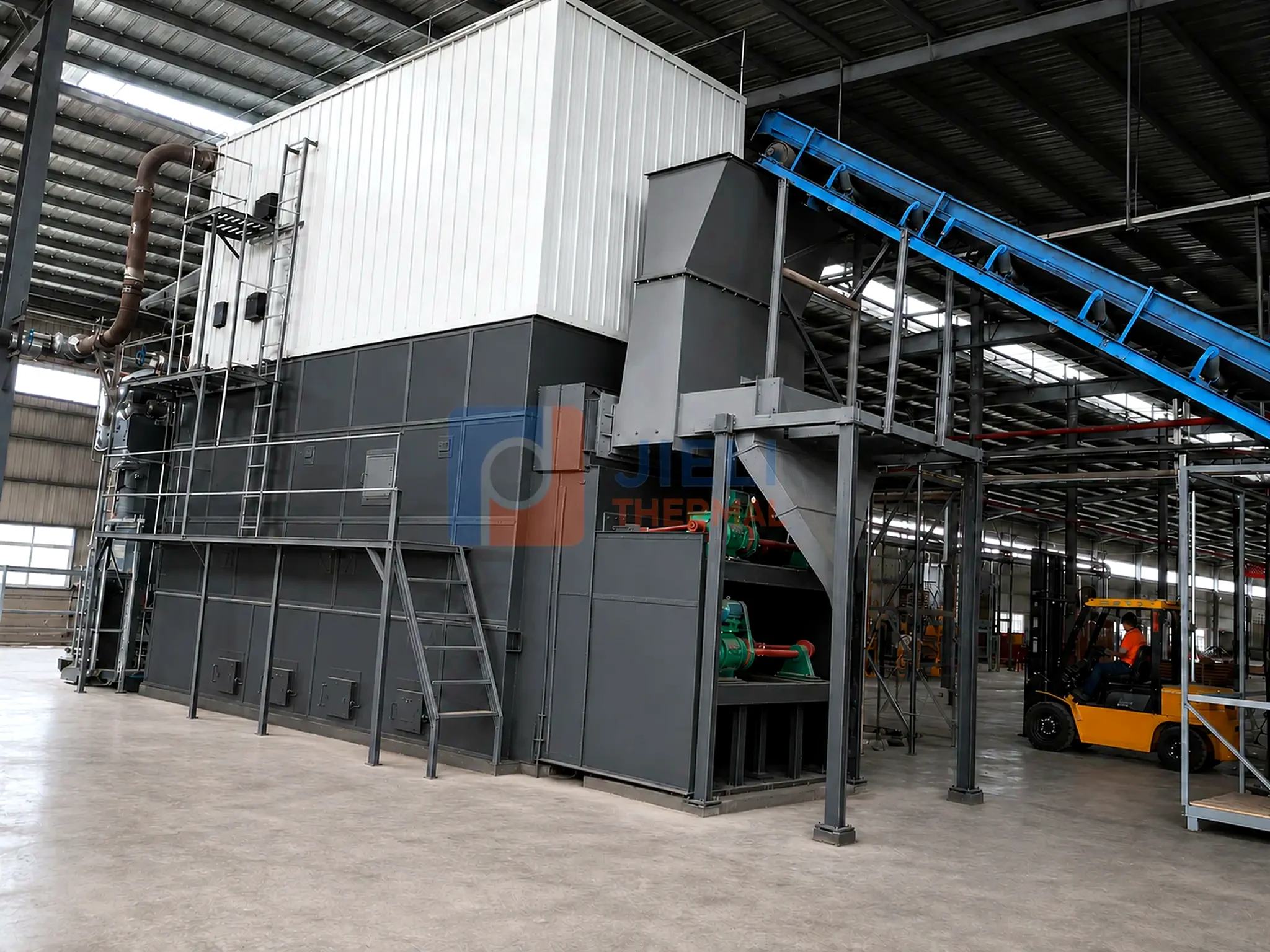 Biomass-fired thermal oil heater system with fuel handling and auxiliaries