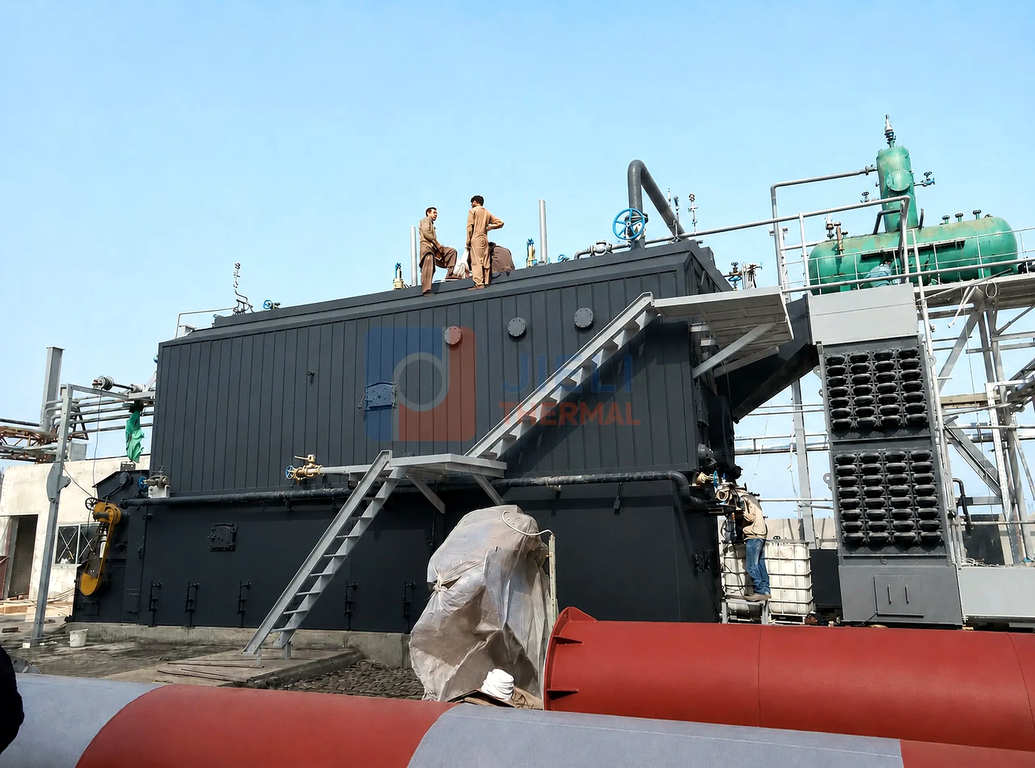 Solid-fuel steam boiler — complete industrial installation with draft and dust-control equipment