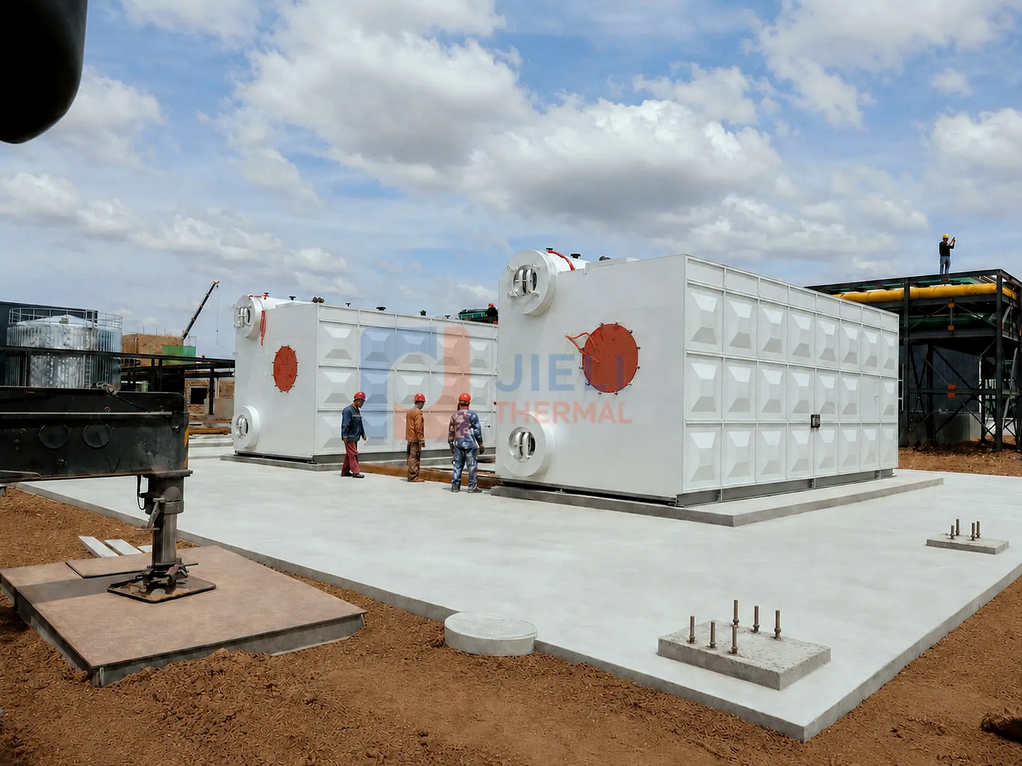 Twin SZS water-tube gas steam boilers installed outdoors with roof access
