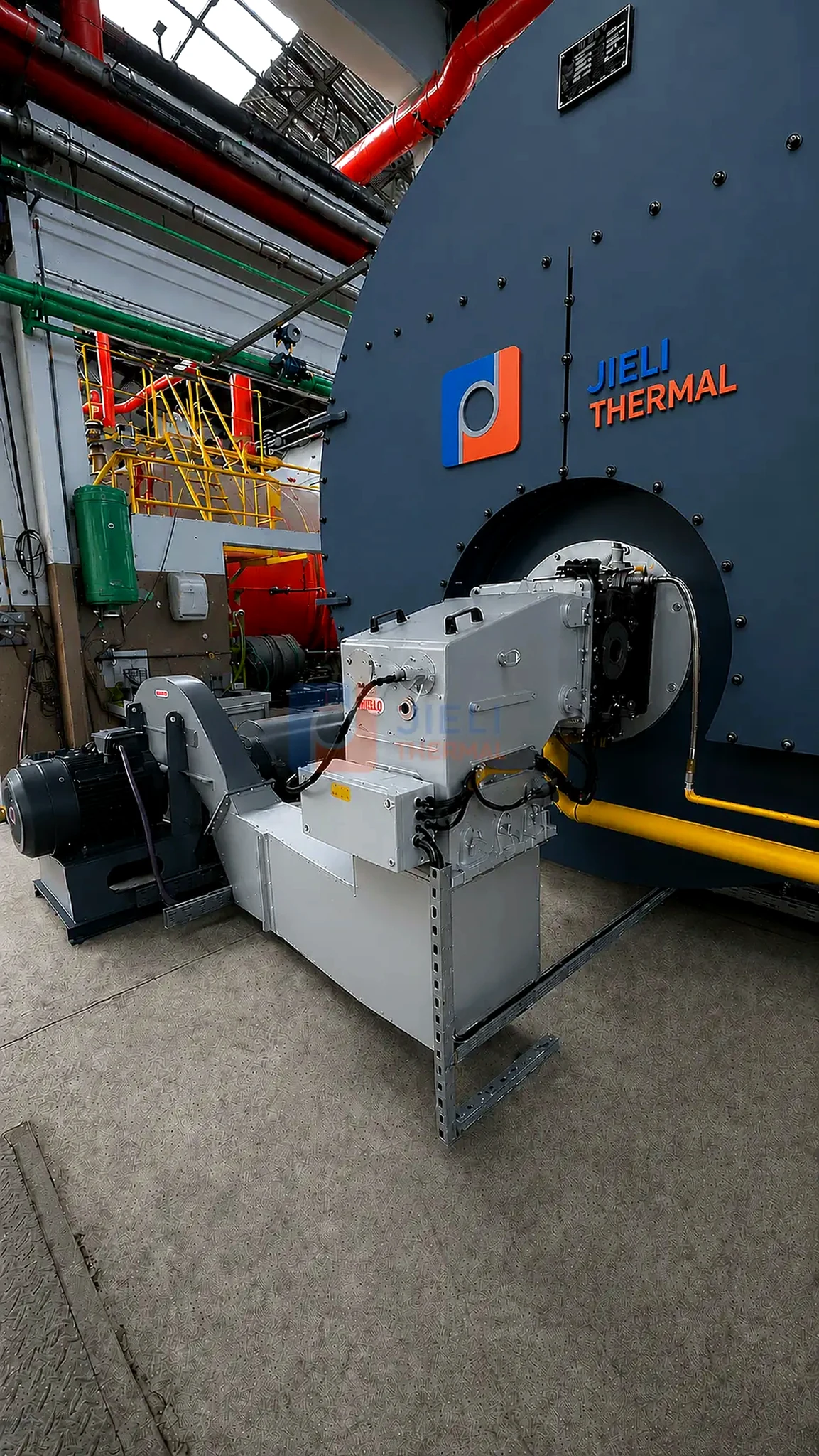 Gas / oil-fired steam boiler — installed side view with process piping