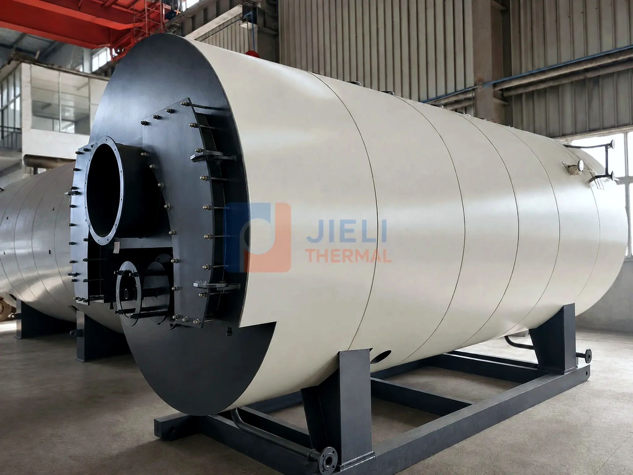 Gas / oil-fired steam boiler shell viewed from the side during assembly