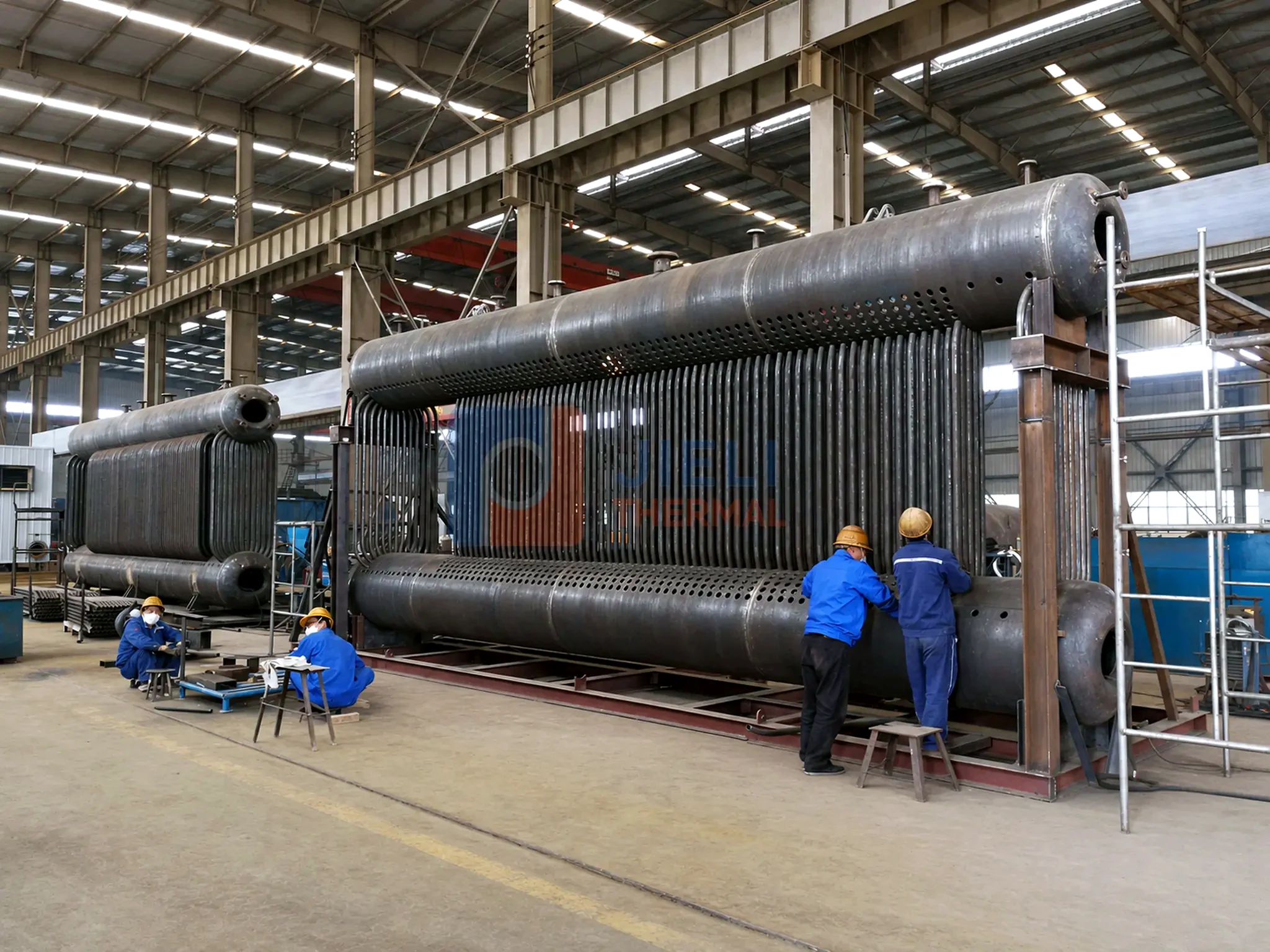 Gas / oil-fired steam boiler — water-tube membrane-wall assembly in production