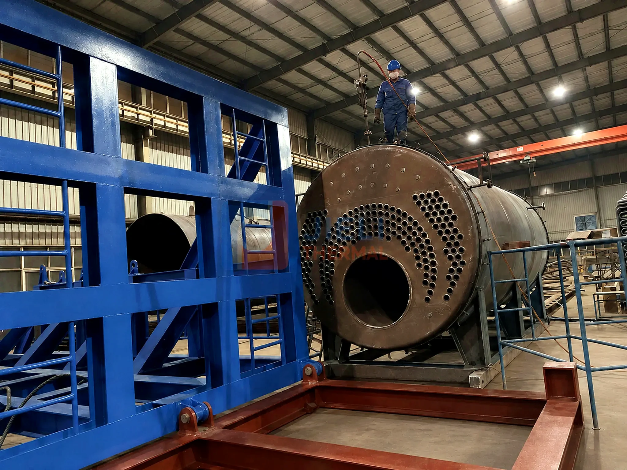 Gas / oil-fired steam boiler — boiler shell and tube-sheet assembly fixture