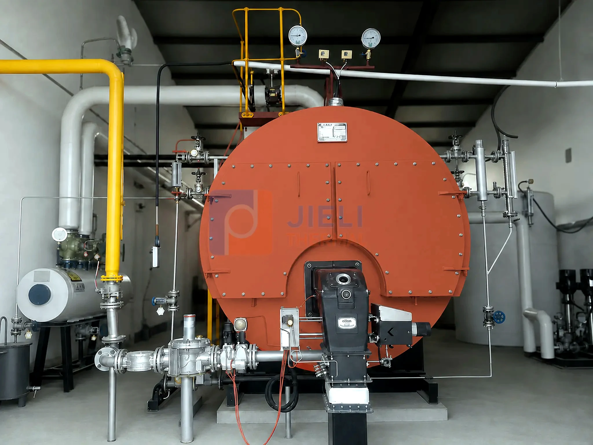 Front view of a WNS wet-back gas steam boiler with burner and gas train