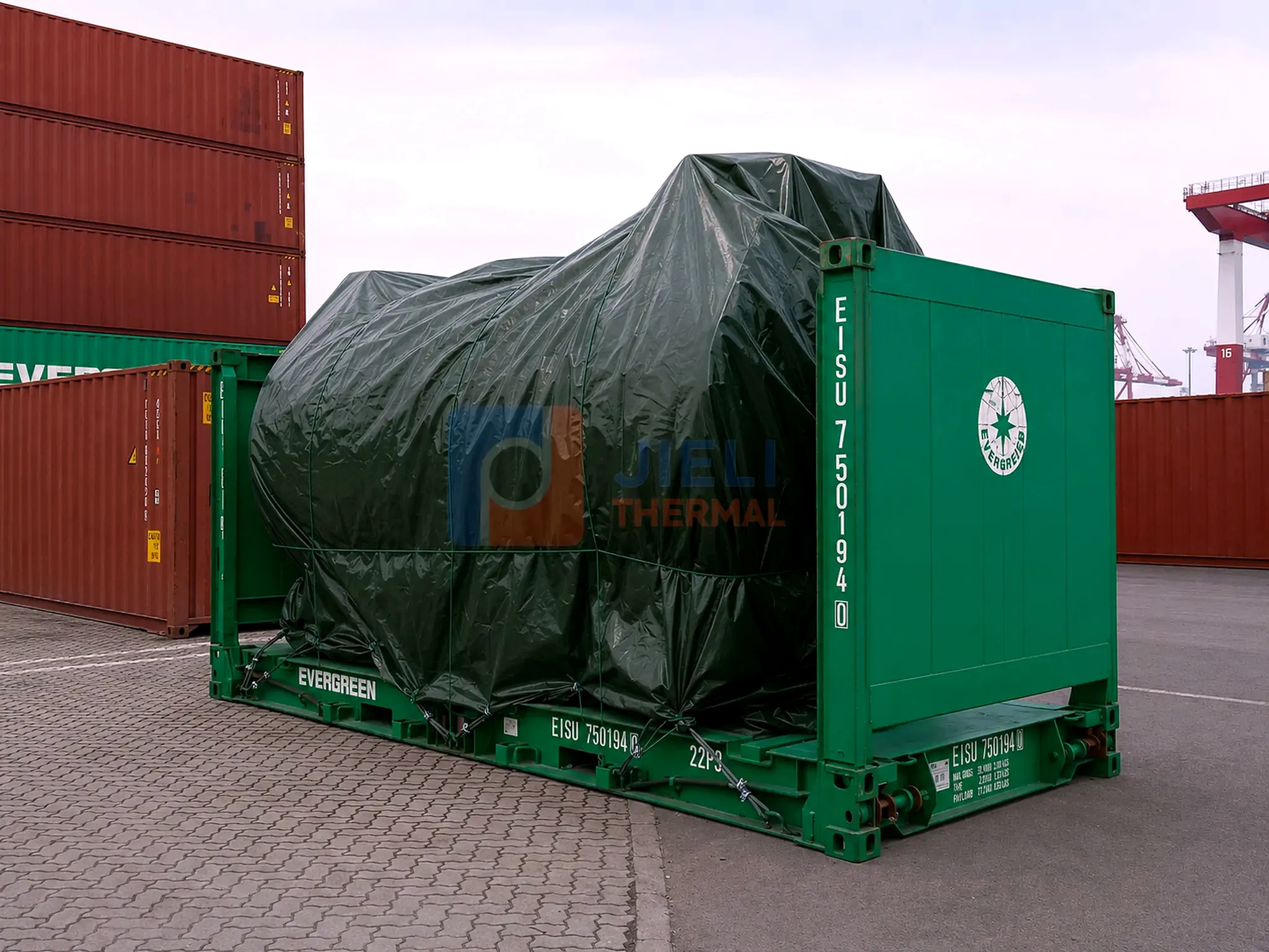 Gas / oil-fired thermal oil heater — protected package secured on a flat-rack container