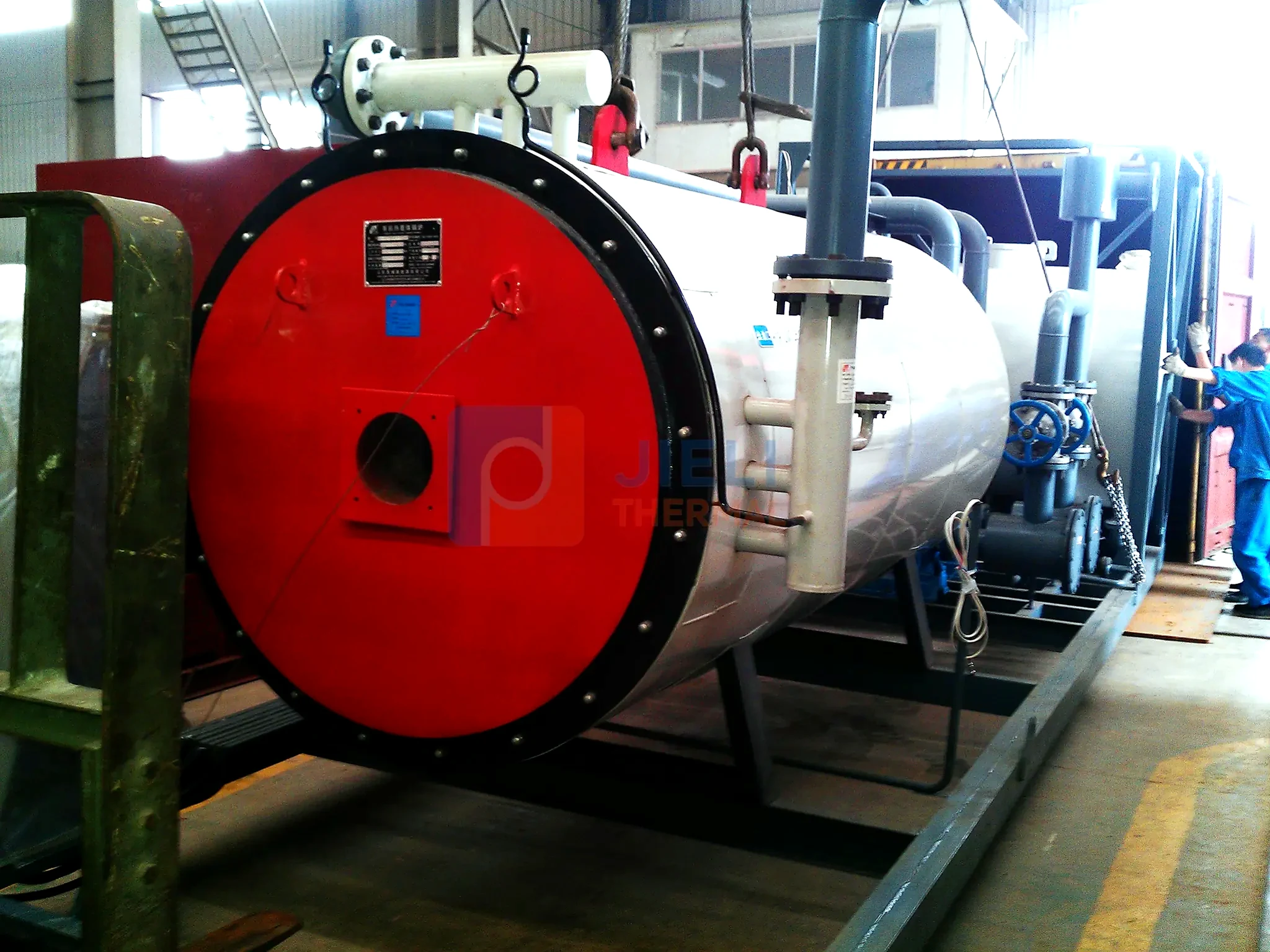 Industrial boiler export delivery — skid-mounted gas-fired heater ready for dispatch