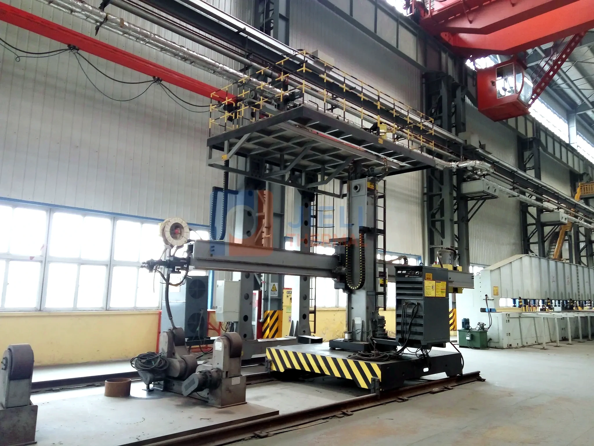 JIELI THERMAL boiler manufacturing — column-and-boom automatic welding station