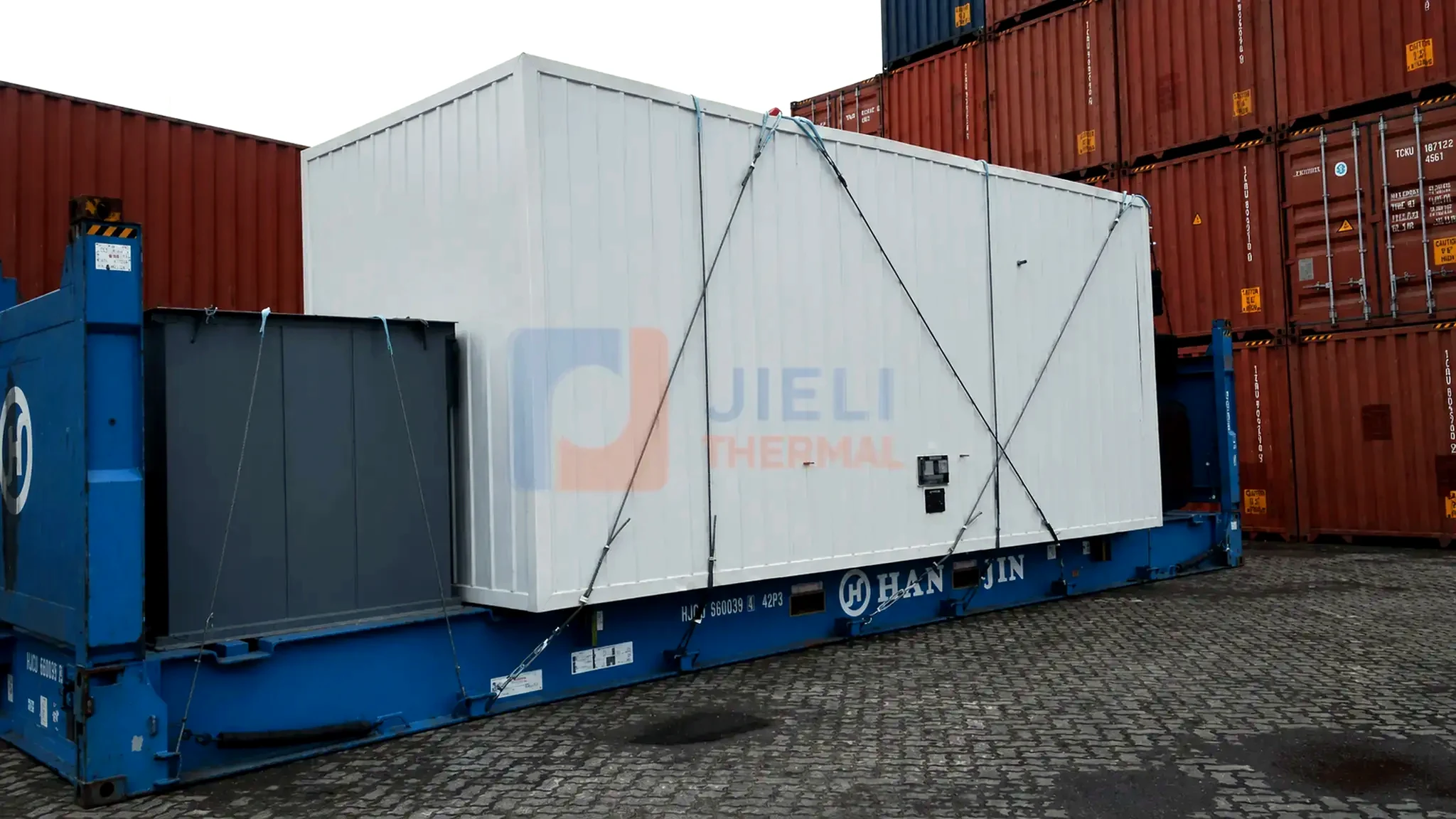 Thermal oil heater secured on a flat-rack container for export