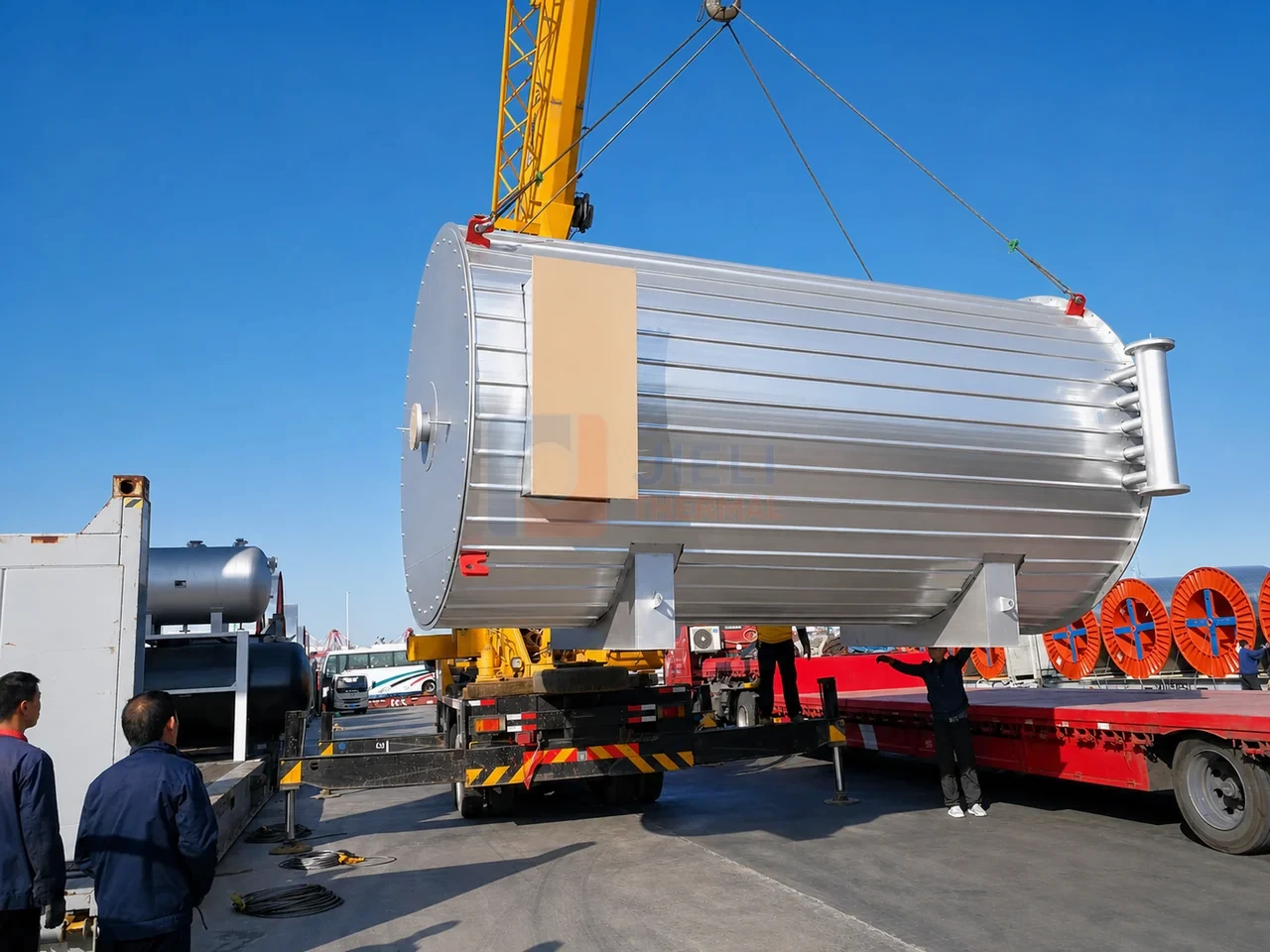 Chile 3,000,000 kcal biomass thermal oil heater body suspended by a crane during export loading