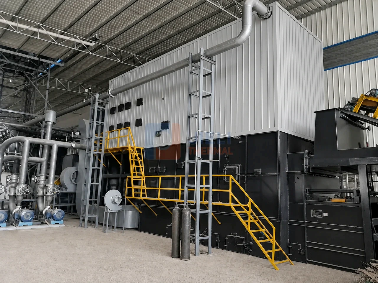 Thailand 8 million kcal biomass thermal oil heater with fuel handling, stairs and process piping